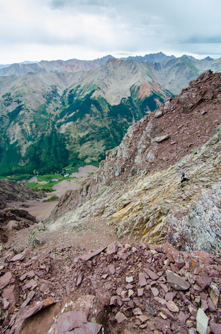 Sarah downclimbs the green gully