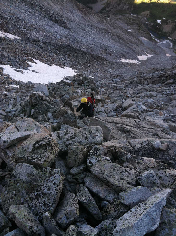 Matt climbing up Snowmass while photographing