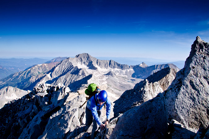 Sarah navigates the exposed ridge on Snowmass Mountain