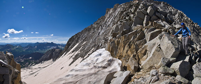 Sarah climbs down Snowmass Mountain towards North Snowmass