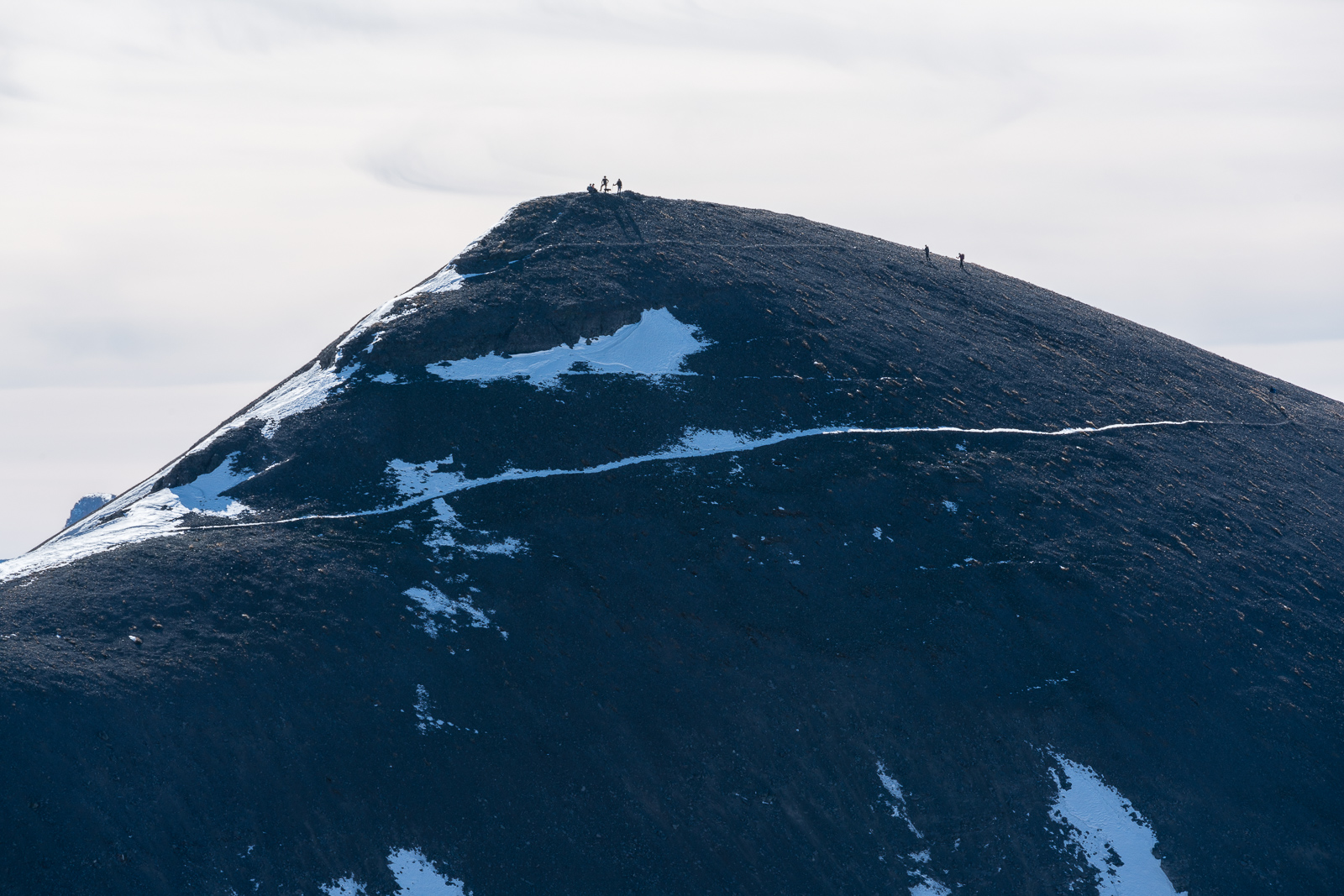 Climbers summit Spencer Peak