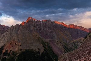 Pyramid Peak and Thunder Pyramid from below North Maroon Peak at sunset